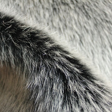 Tip-discharged high pile fur